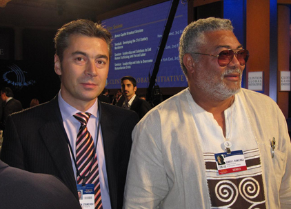 Mr. Stamen Stantchev with the former president of Ghana  Jerry Rawlings at the Clinton Global Initiative in September 2009.